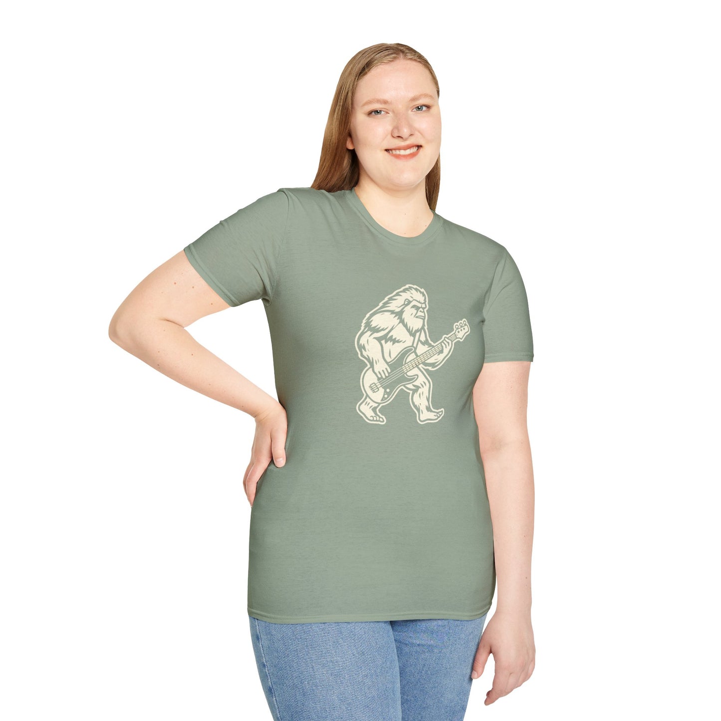 Yeti silhouette with Bass guitar in a cream-colored graphic.