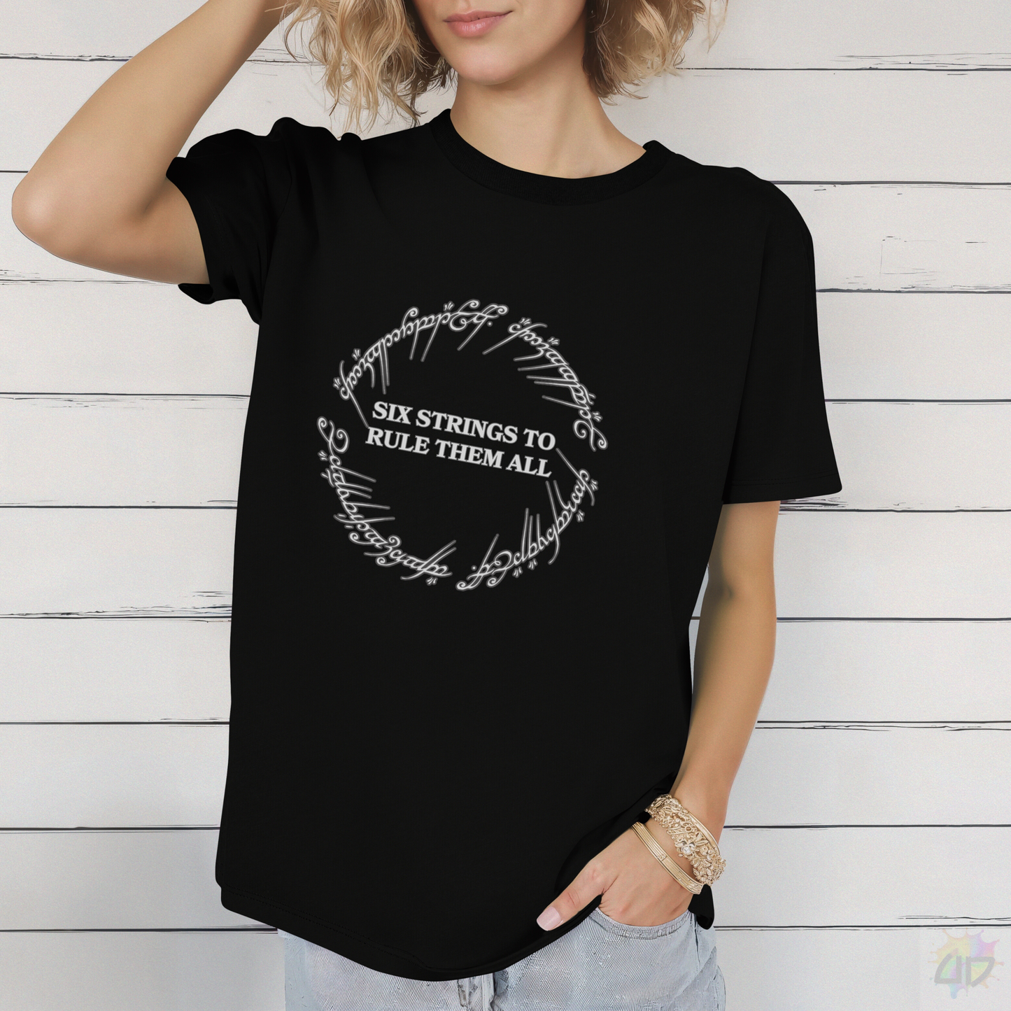 "Six Strings To Rule Them All" in Circular Graphic Tee.