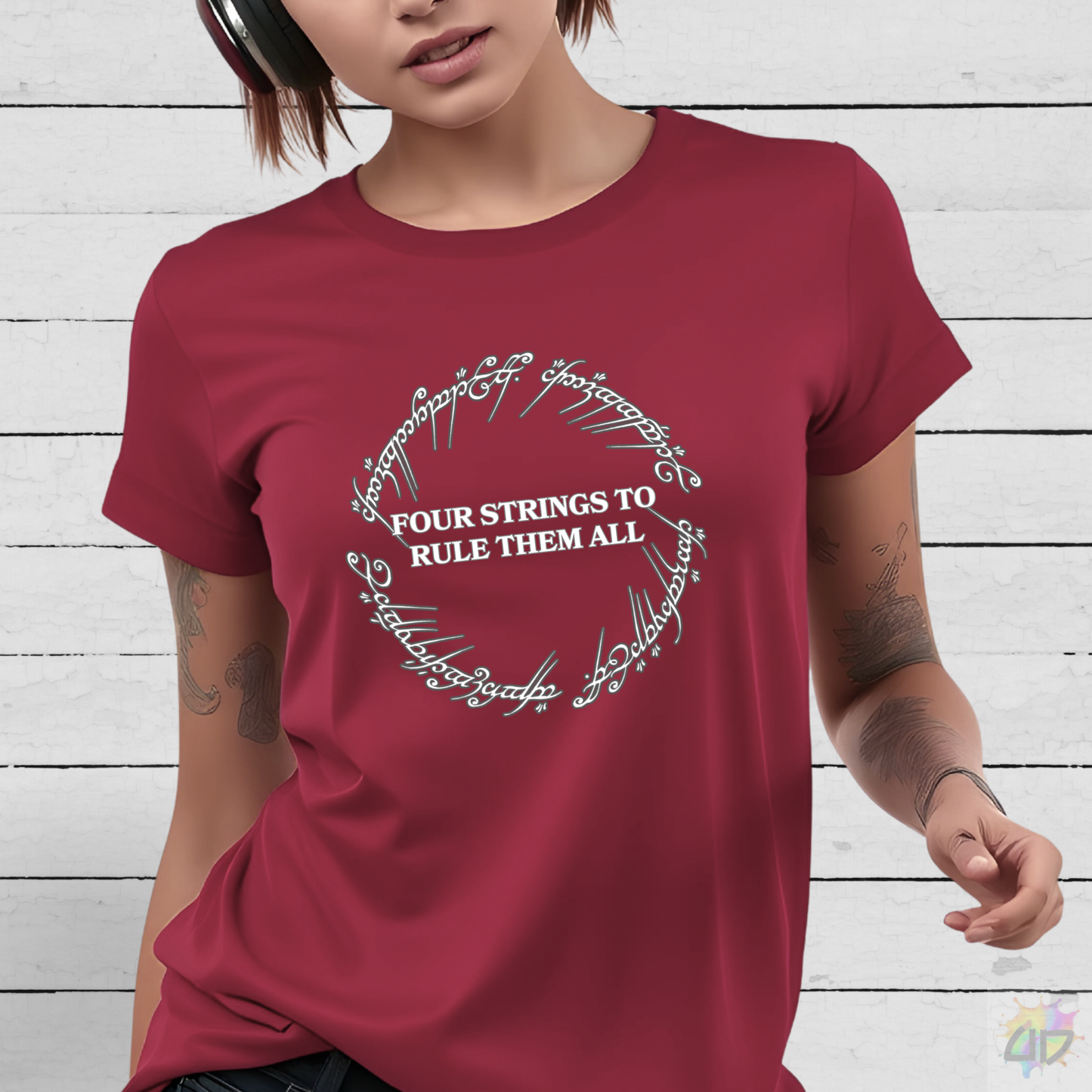 "Four Strings to Rule Them All" in a Circular Graphic Tee.