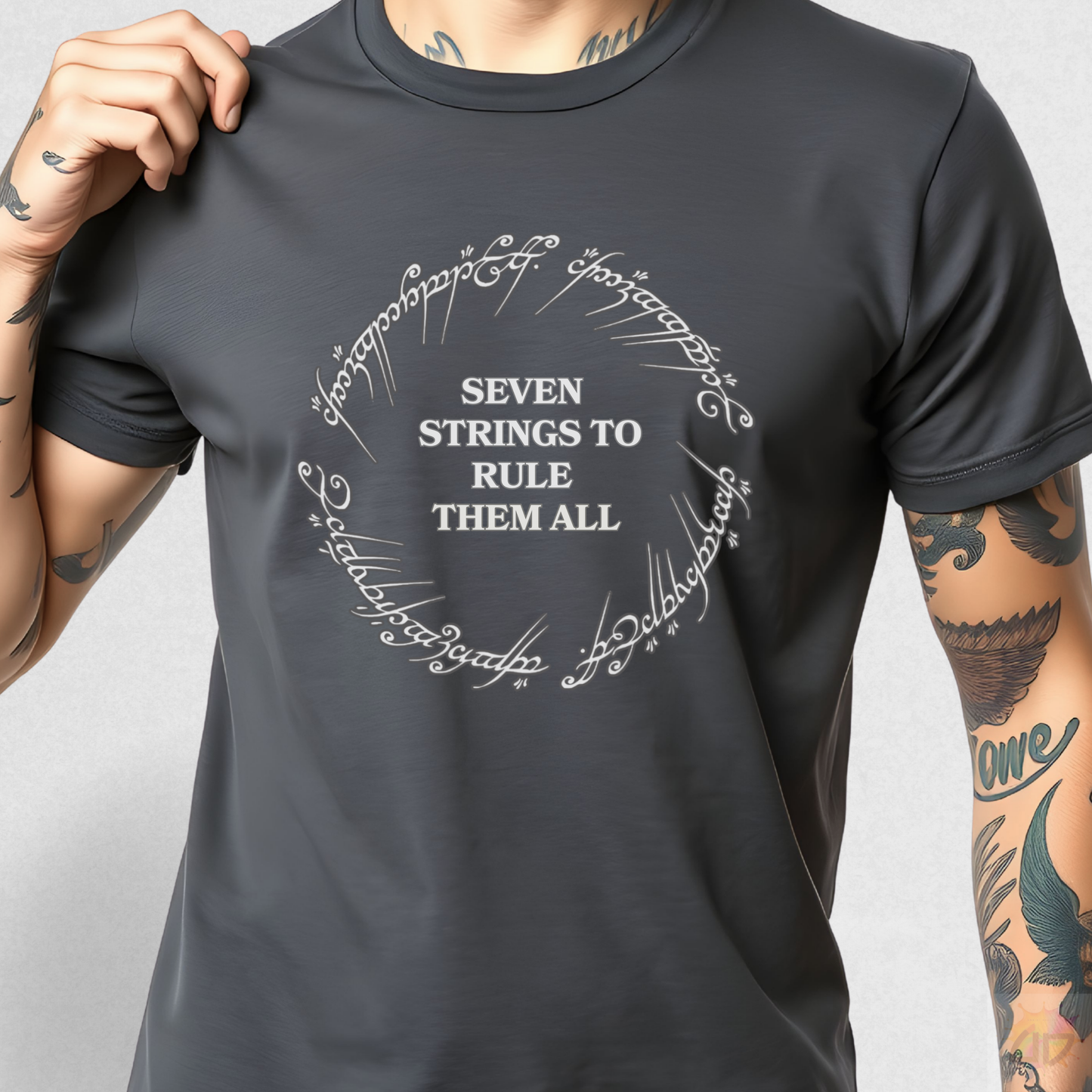 "Seven Strings To Rule Them All" in a Circular Graphic Tee.