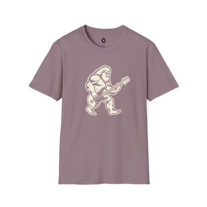 Yeti silhouette with Bass guitar in a cream-colored graphic.