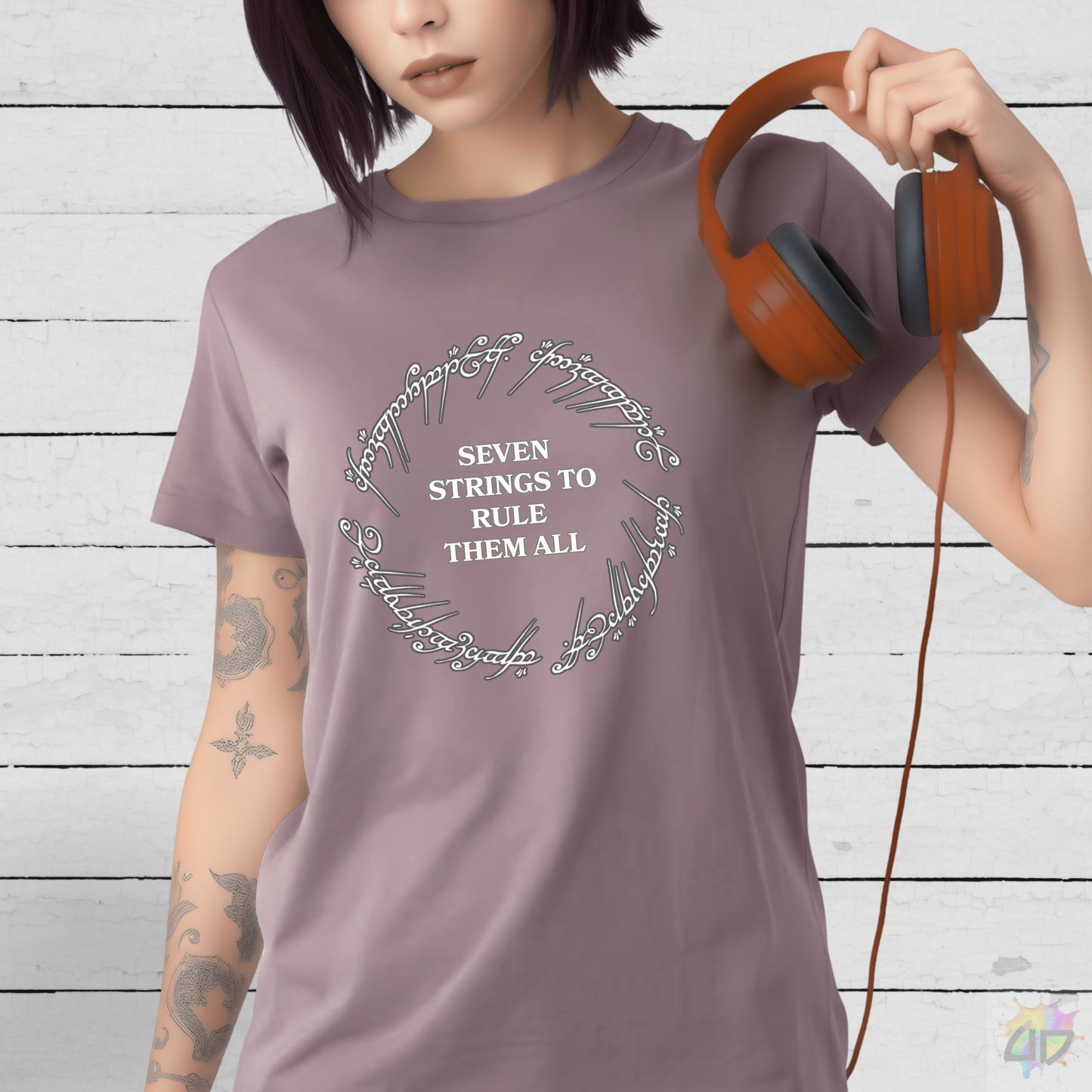 "Seven Strings To Rule Them All" in a Circular Graphic Tee.