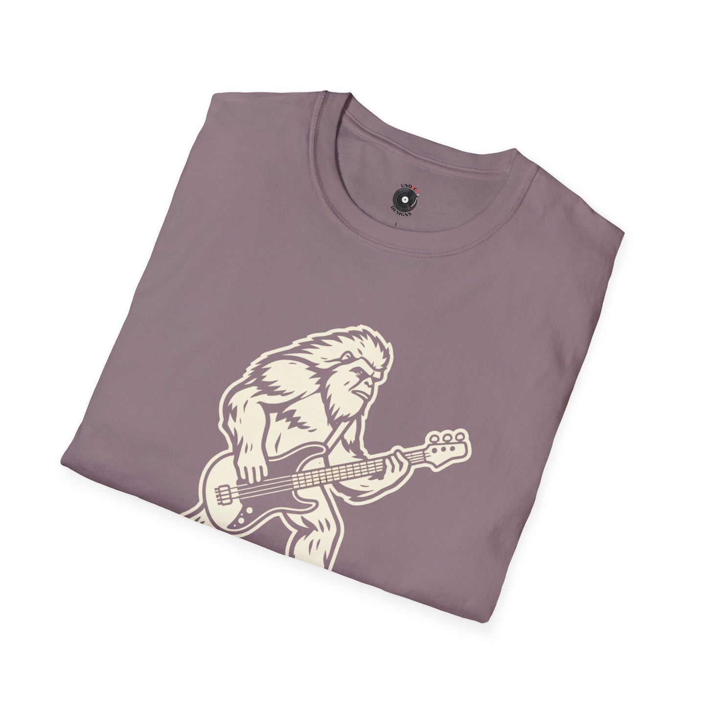 Yeti silhouette with Bass guitar in a cream-colored graphic.