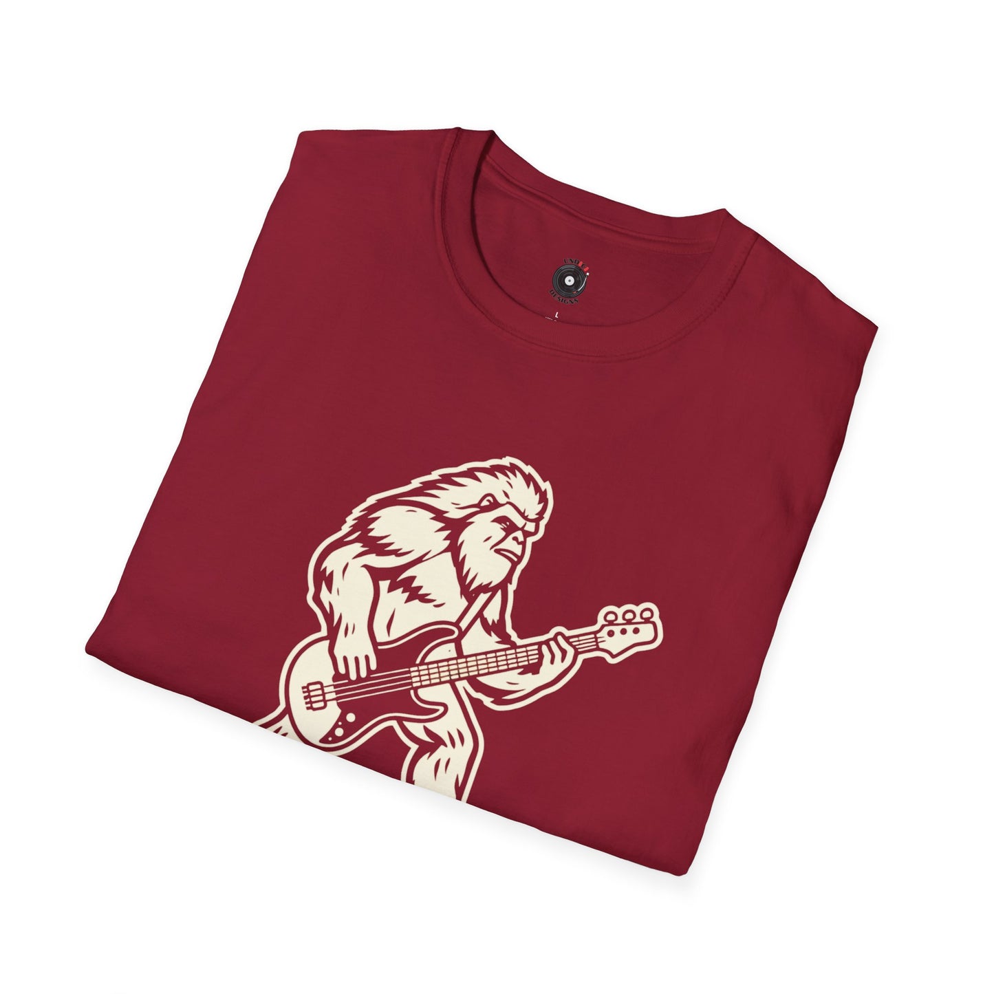 Yeti silhouette with Bass guitar in a cream-colored graphic.