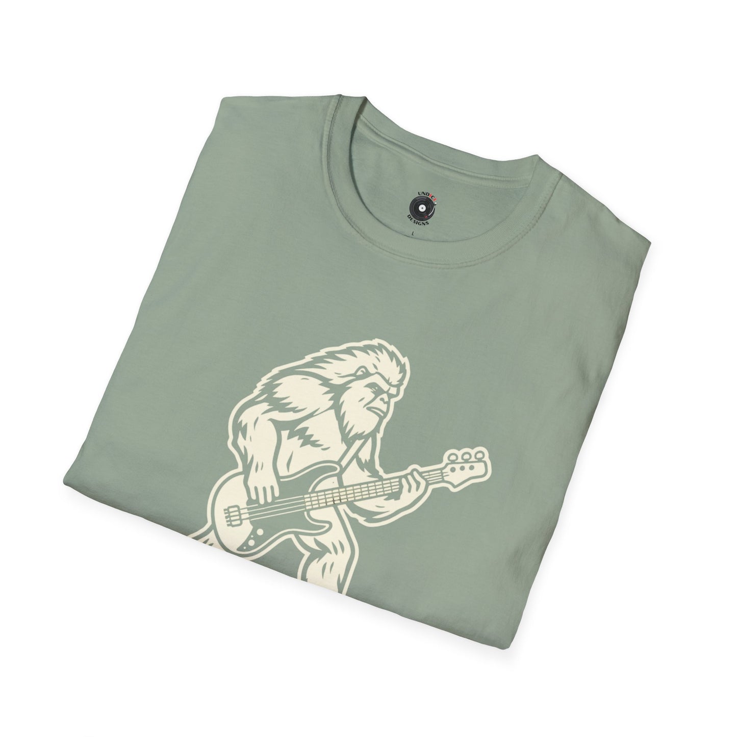Yeti silhouette with Bass guitar in a cream-colored graphic.